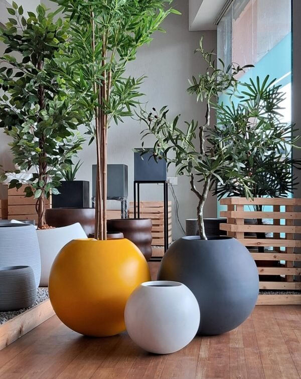 Shop DHARA round FRP planter – sleek, durable, and versatile for indoor and outdoor spaces. Explore stylish and lasting planters at ArtaFlora.com.