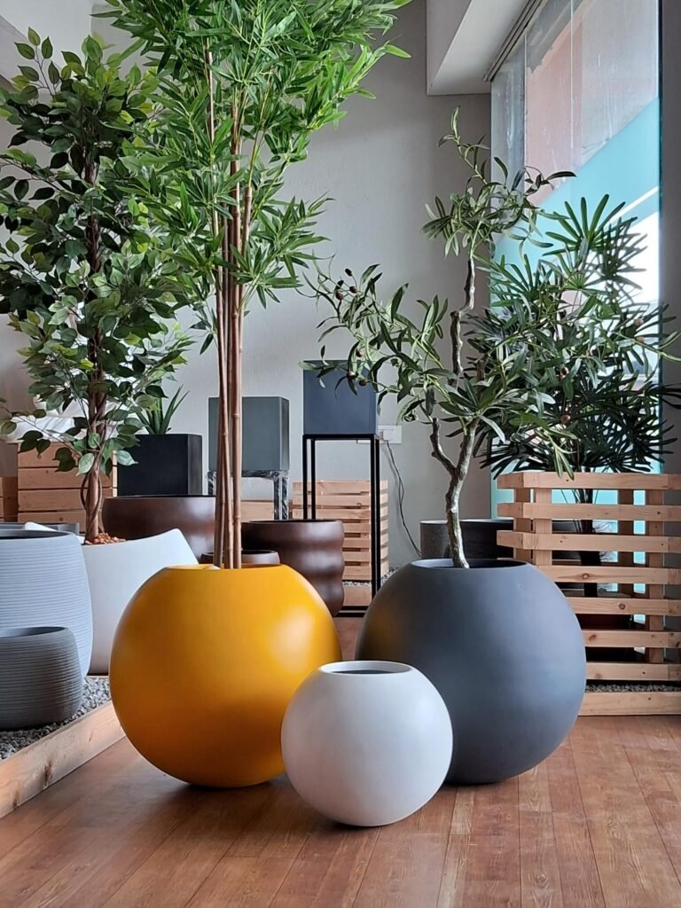 Shop DHARA round FRP planter – sleek, durable, and versatile for indoor and outdoor spaces. Explore stylish and lasting planters at ArtaFlora.com.