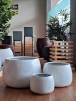 Shop DAHLIA round FRP planter with speckled light gray finish. Durable, stylish, and perfect for various spaces. Explore premium planters now at ArtaFlora.com.