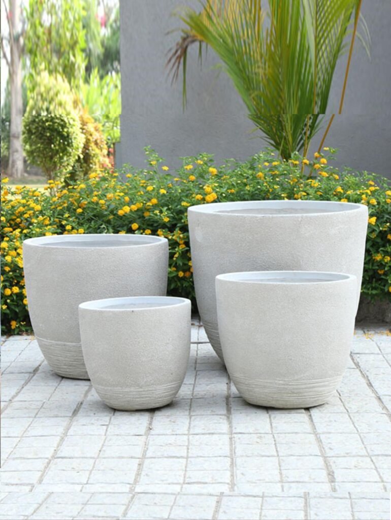 Shop ALEXA round FRP planter with a smooth, durable finish. Perfect for stylish indoor and outdoor settings. Explore now at ArtaFlora.com.