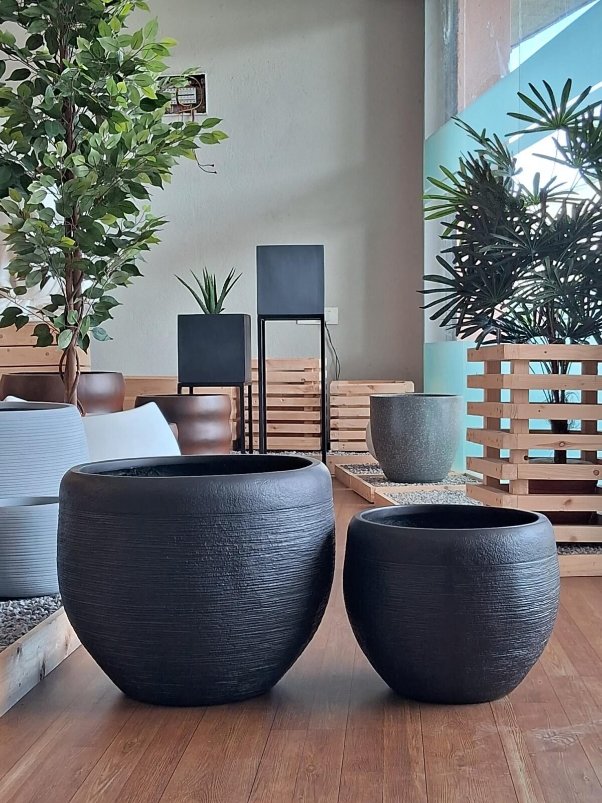 Shop SOBRE gray round FRP planter—lightweight, durable, and perfect for indoor and outdoor plants. Explore stylish pots now at ArtaFlora.com.