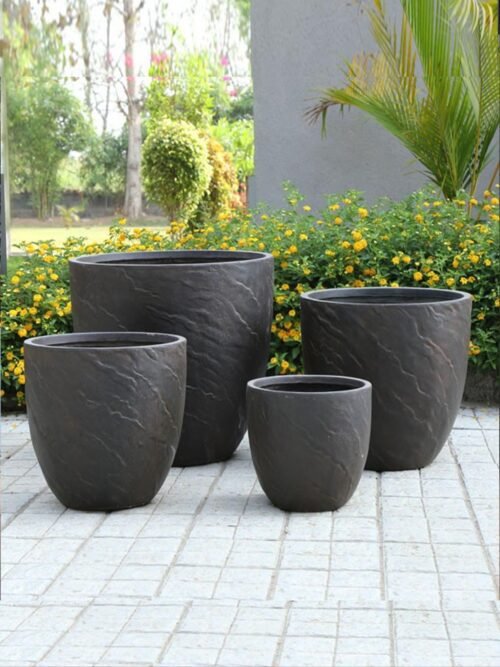 Shop APRILIA round FRP planter with subtle vertical textures. Durable, stylish, and perfect for any indoor or outdoor space. Buy now at ArtaFlora.com.