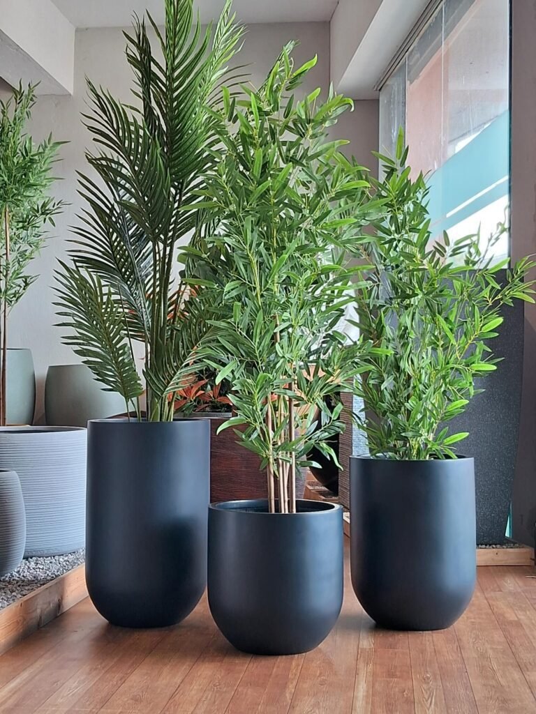 Shop matte black round planters made with premium FRP. Durable, stylish, and weather-resistant for indoor or outdoor use. Available at ArtaFlora.com.