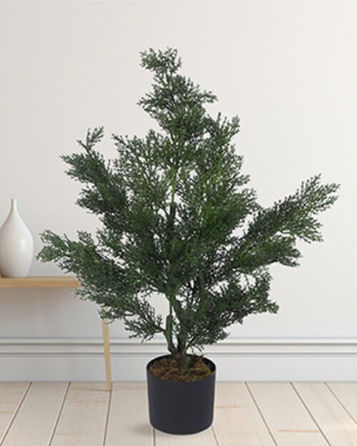 "Artificial Juniper Plant with lifelike needle-like foliage in a modern home setting"