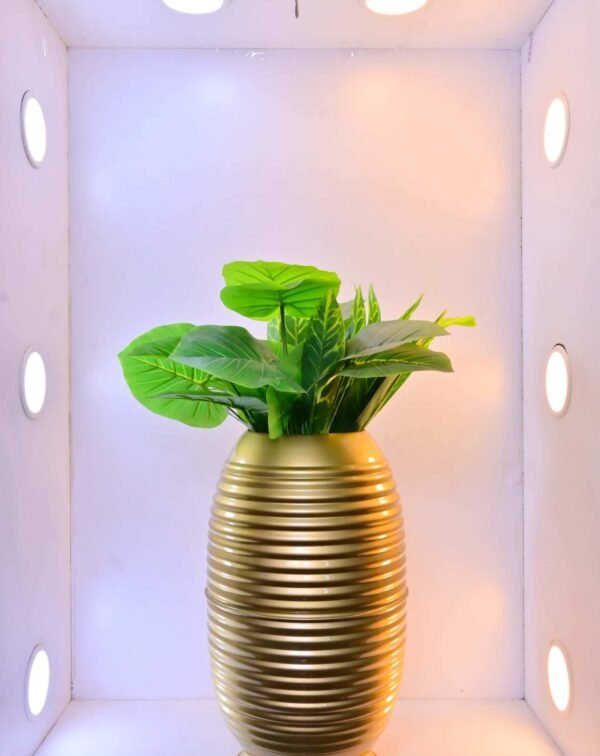 Shop the Cylindrical Metallic Ribbed Planter - 21 Inch, perfect for modern decor and plant displays. Add style and elegance to your home with ArtaFlora.com.