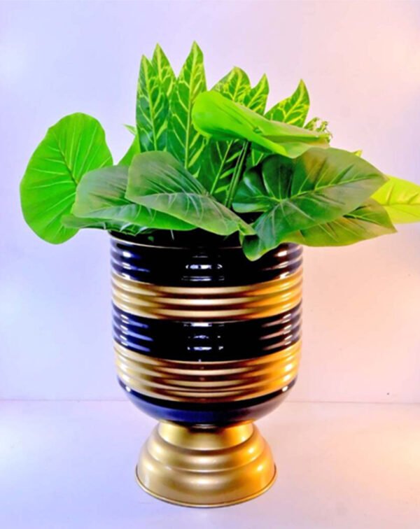 Add elegance to your space with the Unique Pedestal Stripe Planter. This 13-inch tall planter brings modern style and functionality. Shop now at ArtaFlora.com.