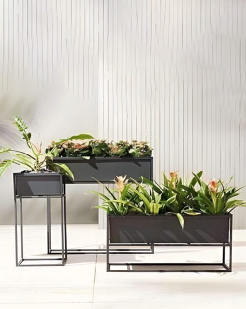 Shop the Modern Geometric Metal Raised Planter Trio for home & garden. This elegant set of planters adds a contemporary touch to your space. Shop now at ArtaFlora.com.