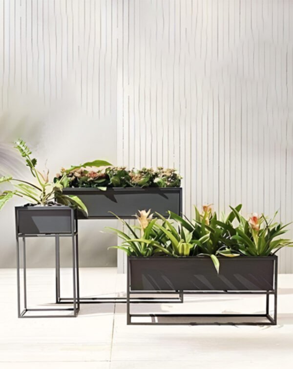 Shop the Modern Geometric Metal Raised Planter Trio for home & garden. This elegant set of planters adds a contemporary touch to your space. Shop now at ArtaFlora.com.