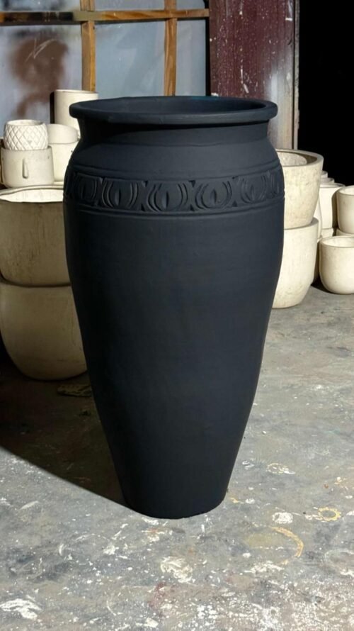 Discover the Handcrafted DINDIGUL Terracotta Urn, a spacious planter that brings traditional charm to your garden or home. Shop now at ArtaFlora.com.