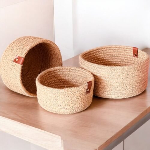 Tall oval jute rope laundry hamper for dirty clothes. Woven storage basket with sturdy handles, ideal for home organization. Size: 14×18 inch.