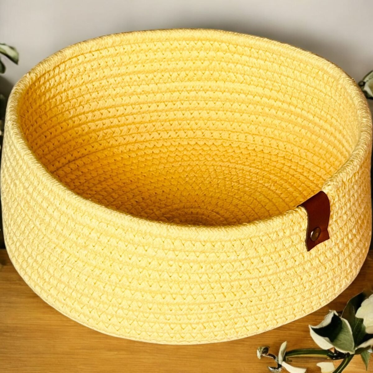 Handwoven multicolor round basket made from natural cotton rope. A compact and stylish shelf storage solution for kitchens, bathrooms, and bedrooms.