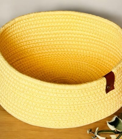 Handwoven multicolor round basket made from natural cotton rope. A compact and stylish shelf storage solution for kitchens, bathrooms, and bedrooms.