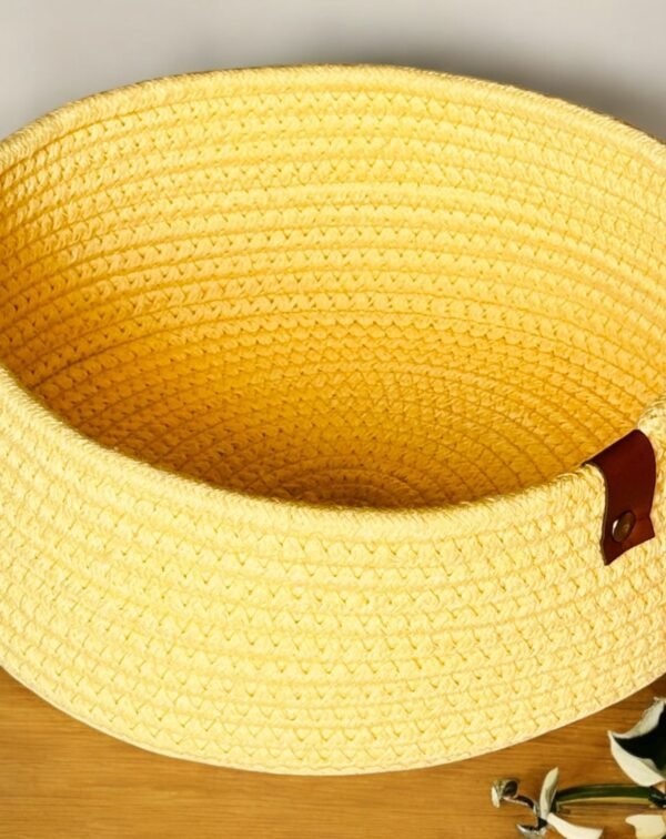 Handwoven multicolor round basket made from natural cotton rope. A compact and stylish shelf storage solution for kitchens, bathrooms, and bedrooms.