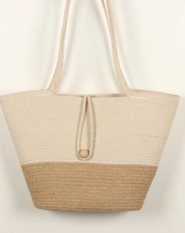 Shop the FAIR Lady handcrafted cotton and jute tote bag. A minimalist, eco-friendly shoulder bag perfect for everyday use, beach days, and travel.