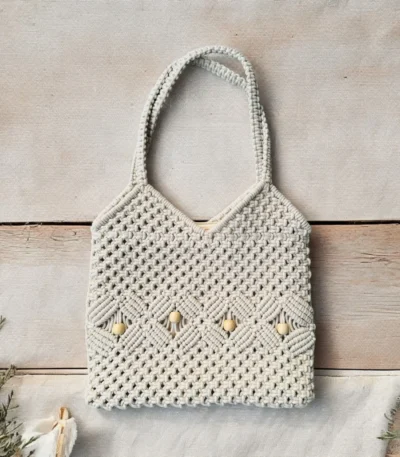 Shop the European-styled handcrafted macrame tote – a stylish 12x13 inch cotton crochet handbag perfect for beach days, brunch, and everyday chic.