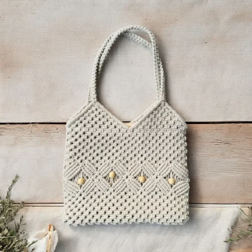 Shop the European-styled handcrafted macrame tote – a stylish 12x13 inch cotton crochet handbag perfect for beach days, brunch, and everyday chic.